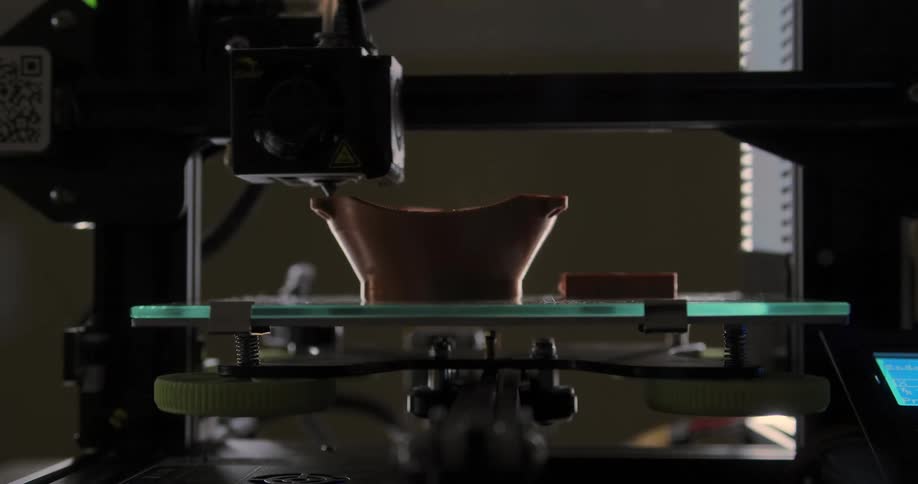 A 3d printer is forming a shape