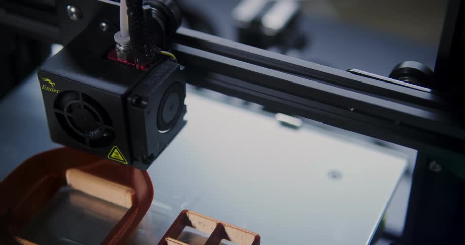 A 3d printer works to create a product