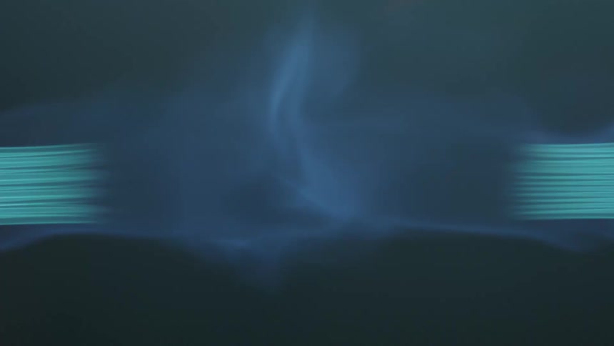 A machine generates a blue flame from glowing filaments