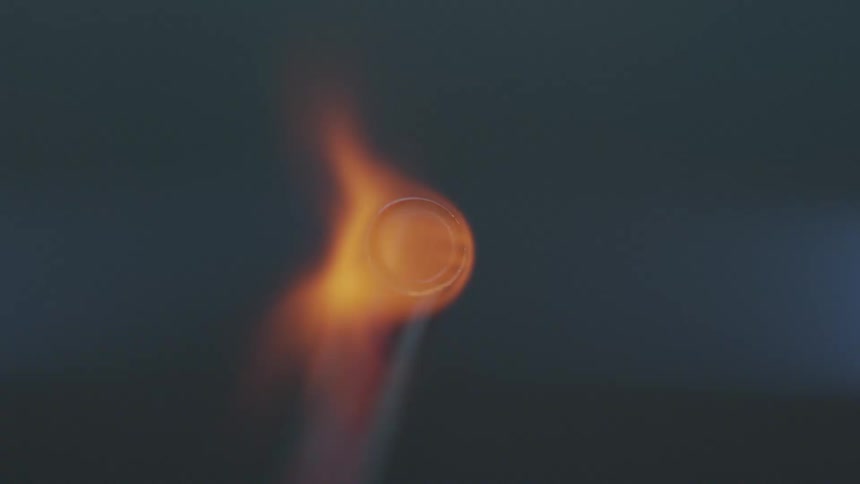 The orange flame of a gas powered torch