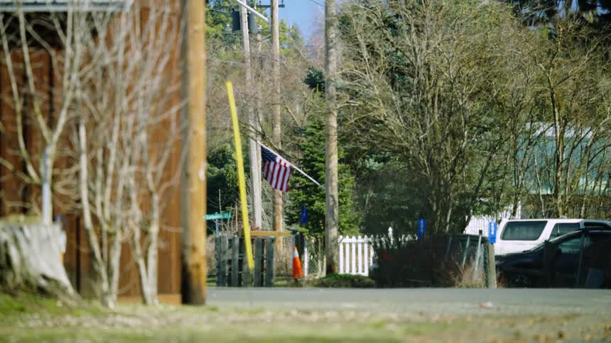 Looking at a real American working town as the car moves through the neighborhood at the end of a long work day