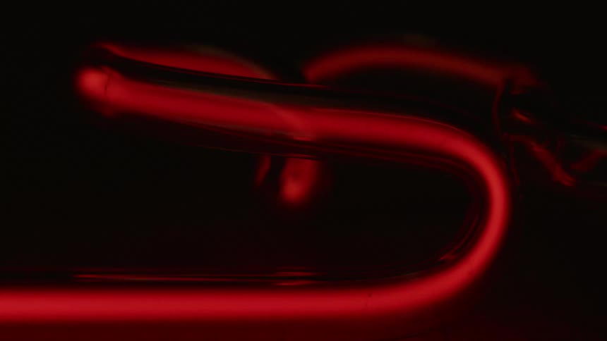 An oddly shaped tube slowly lights up