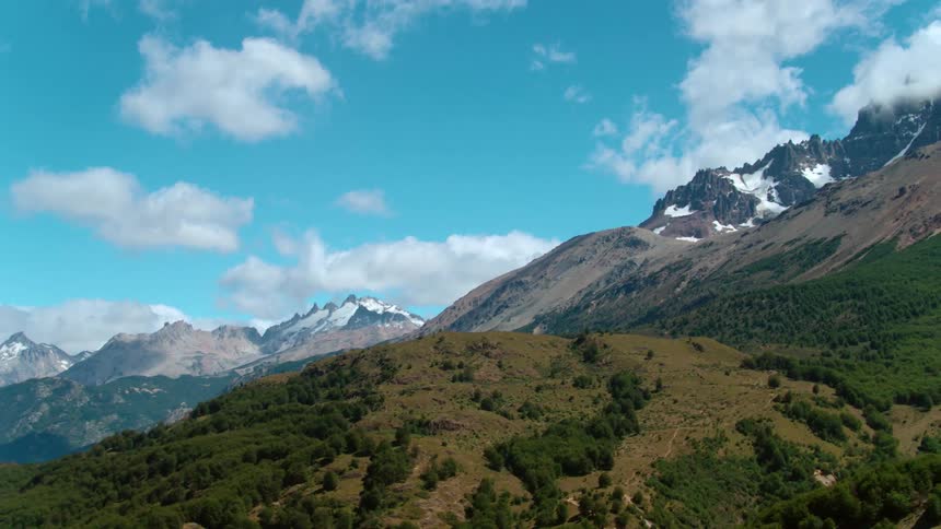 The mountain is covered with green as you go up
