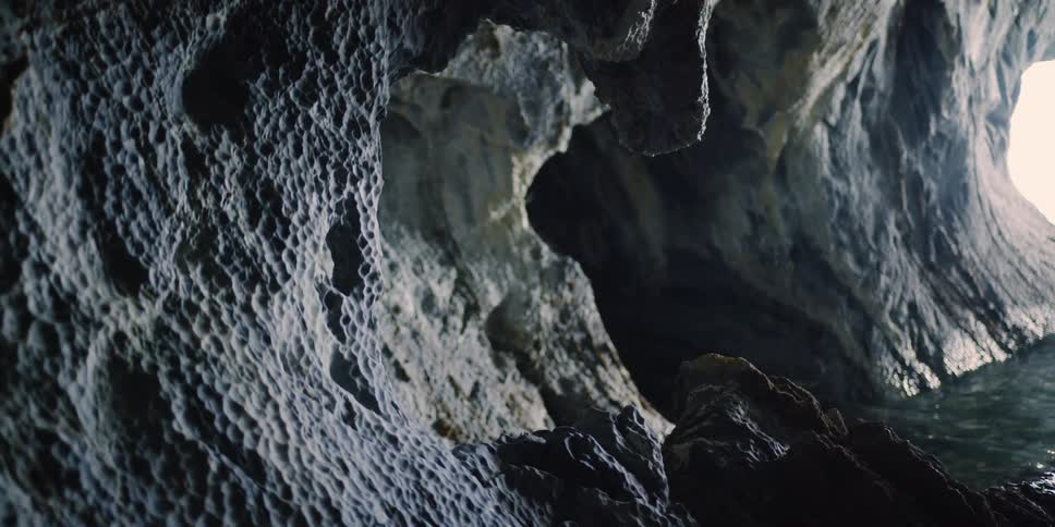 The light is peeking into the wet cave