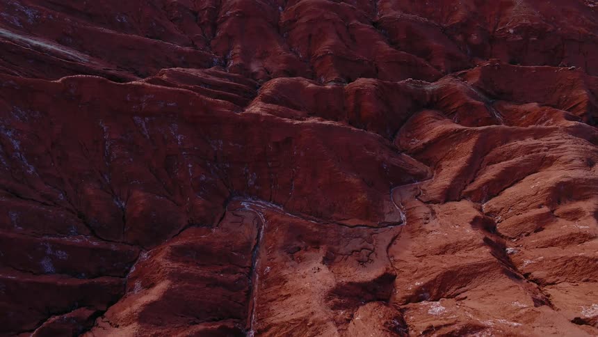 The cavern is full of red rocks