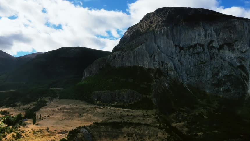 Time lapse of the clouds moving over a cliff