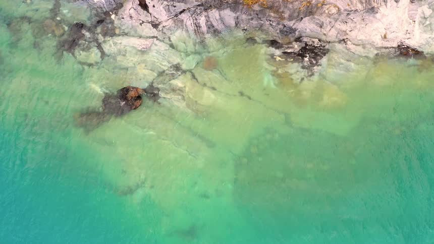 Birds eye view of water at the rocky shore