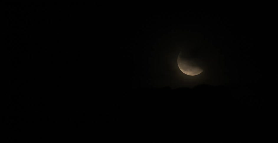 The moon in the night sky