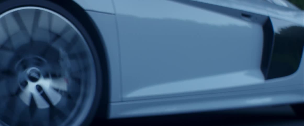 Sports Car Driving In The Early Morning
