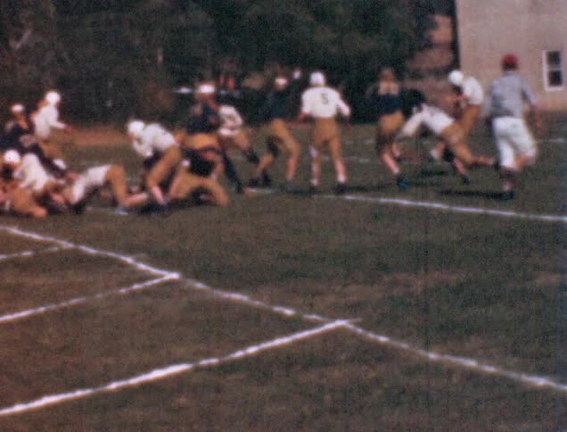 A kicker punts the football during a game