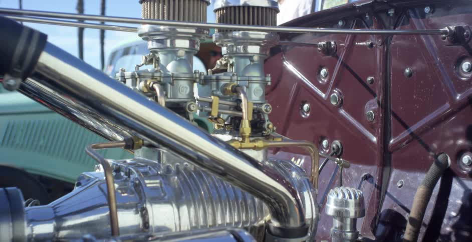 The sun reflects off the silver color of the engine