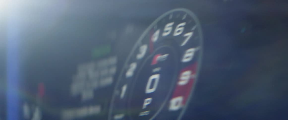 A speedometer is going up and down in a shaking area
