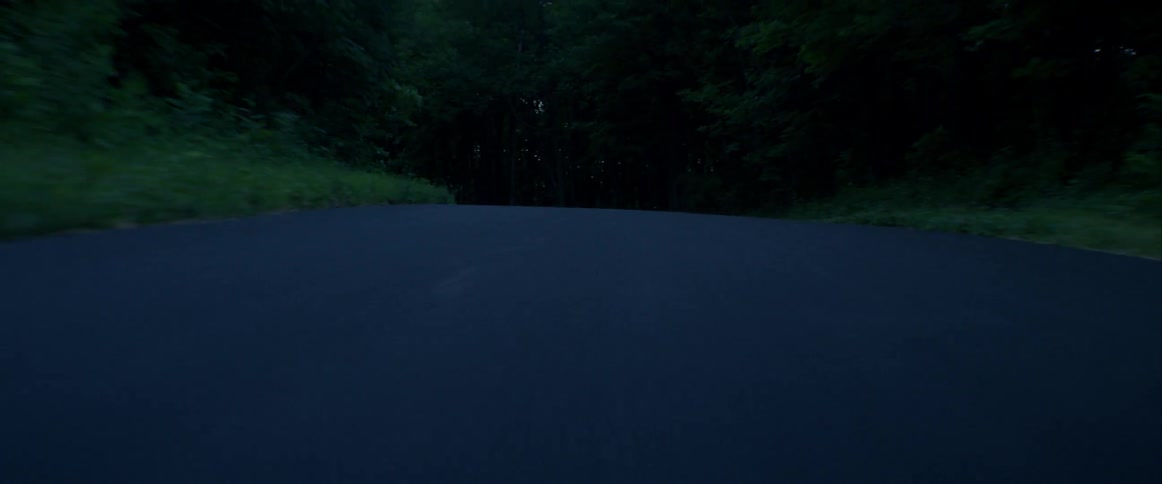 Sports Car Driving In The Early Morning