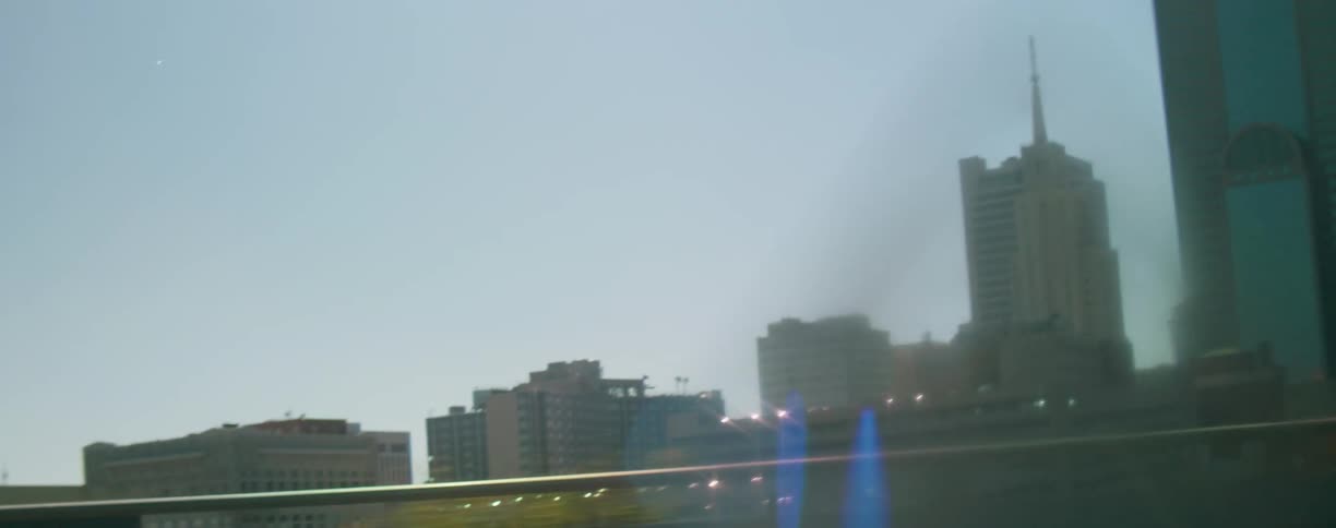 A downtown city is displayed at midday