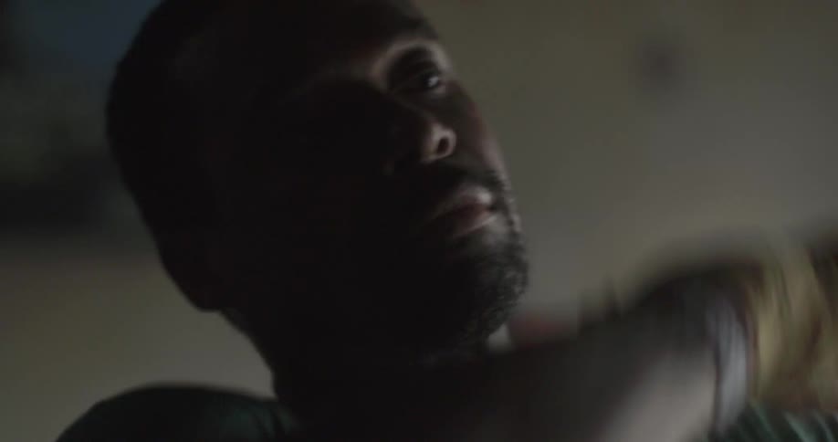 A man trains on a speed bag in a gym