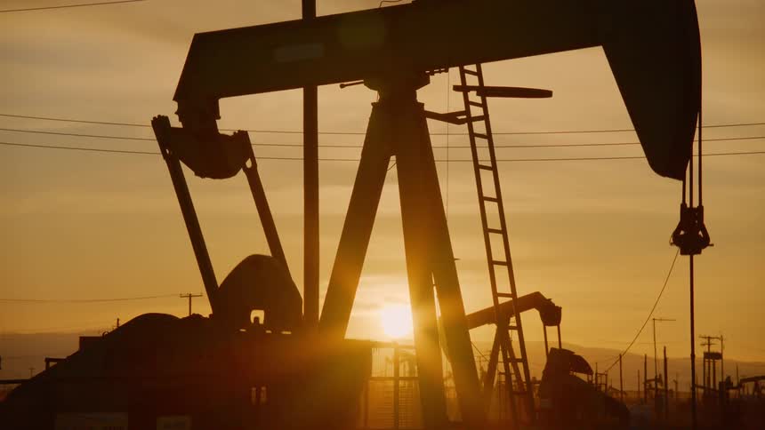 A pump jack in an oil field