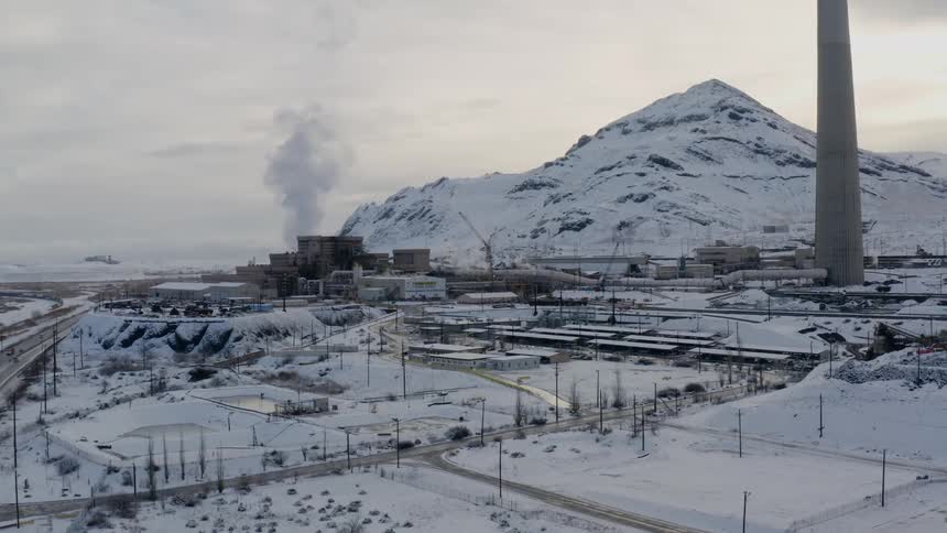 A snow covered rural area is displayed