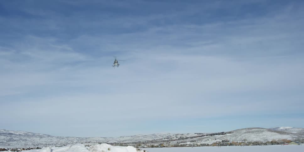 Helicopter coming in for a landing in the arctic