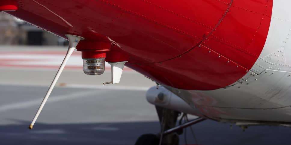 A light blinking on the underside of the tail of a helicopter