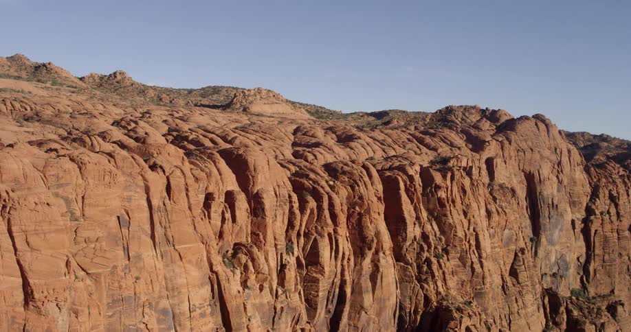 Rocky cliff side of a mountain in the desert