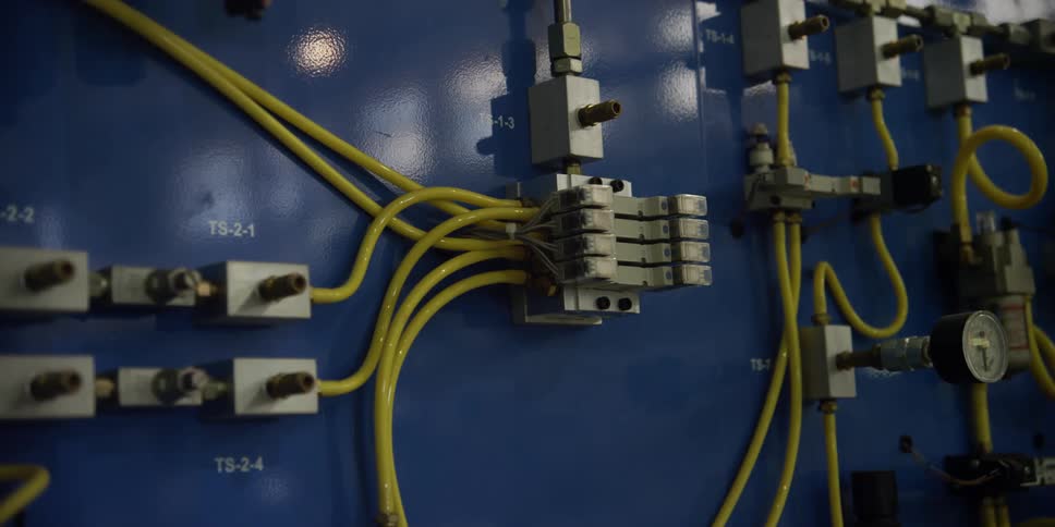 Cables run from circuits to breakers in an electrical system