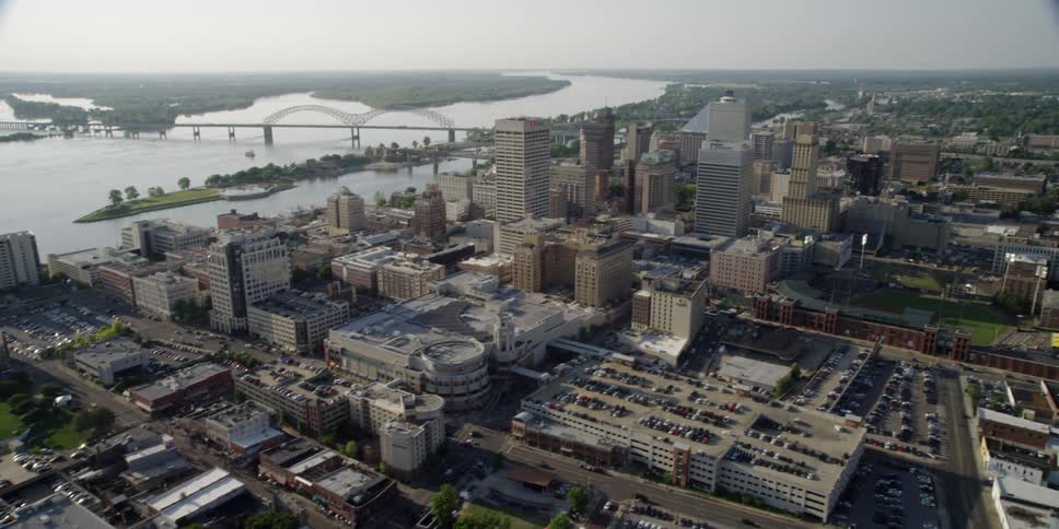A river runs by a large downtown area of a city