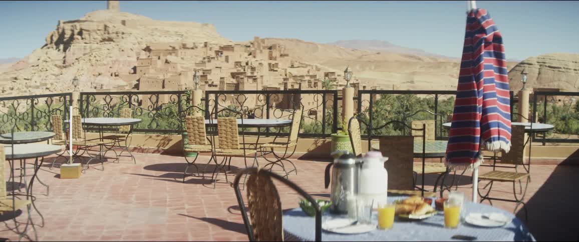A restaurant patio has clear views of a canyon
