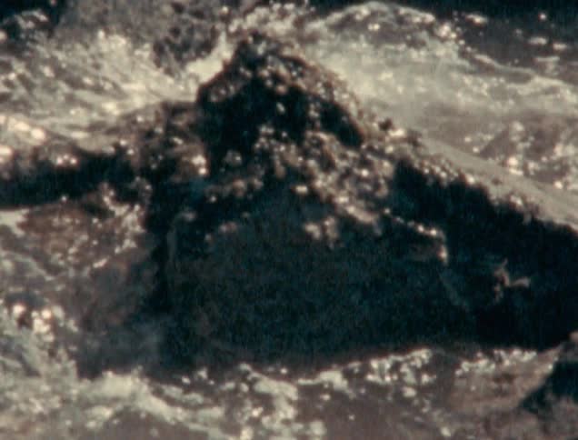 A rocky shore with waves