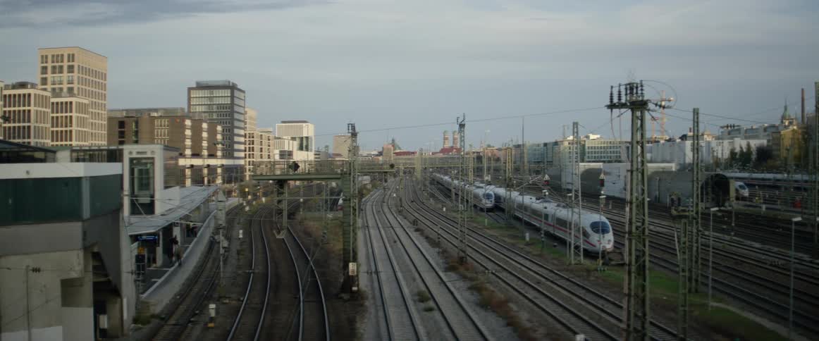 A train stopped on tracks in the city