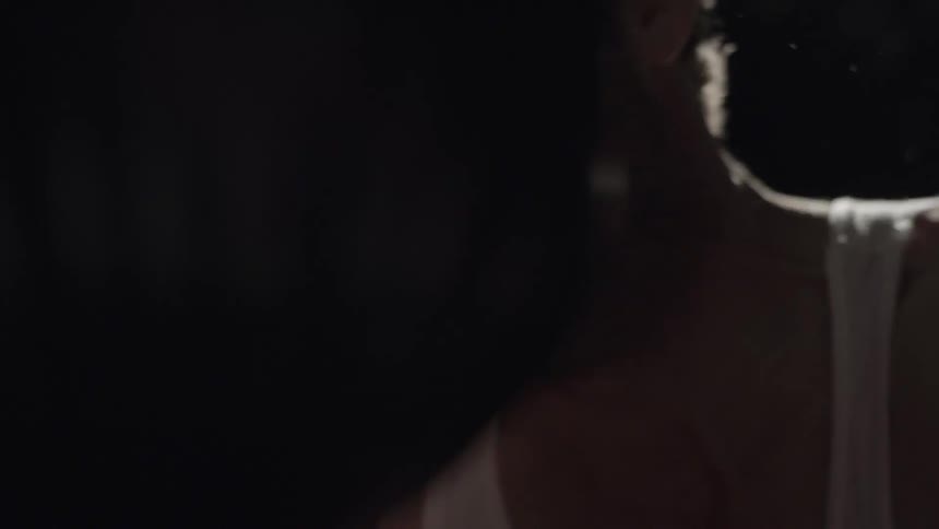 A man trains boxing on a heavy bag
