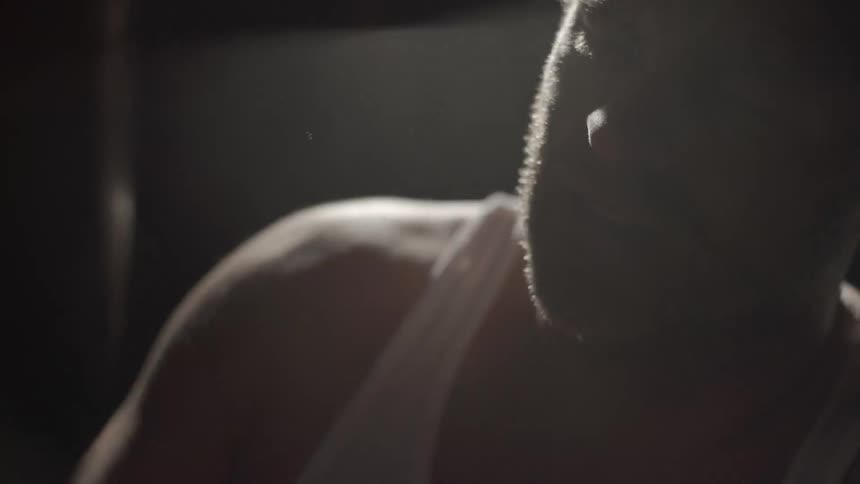 A man punching a punching bag