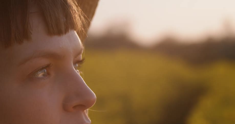 A woman is watching the sunrise