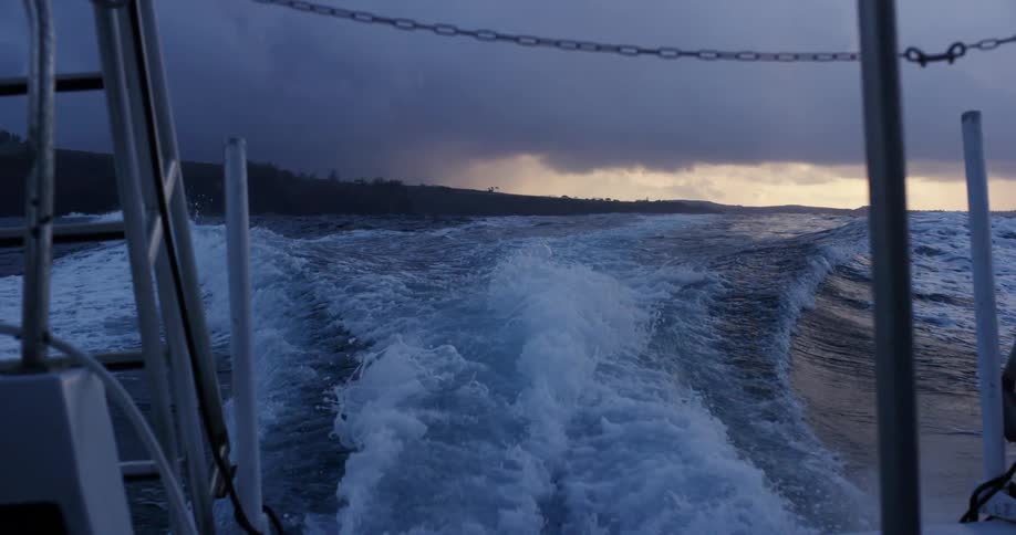 Waves coming off the back of a boat