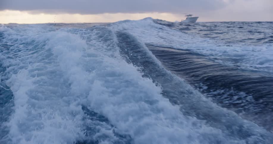 Violent waves emerging in the wake of a pair of boats