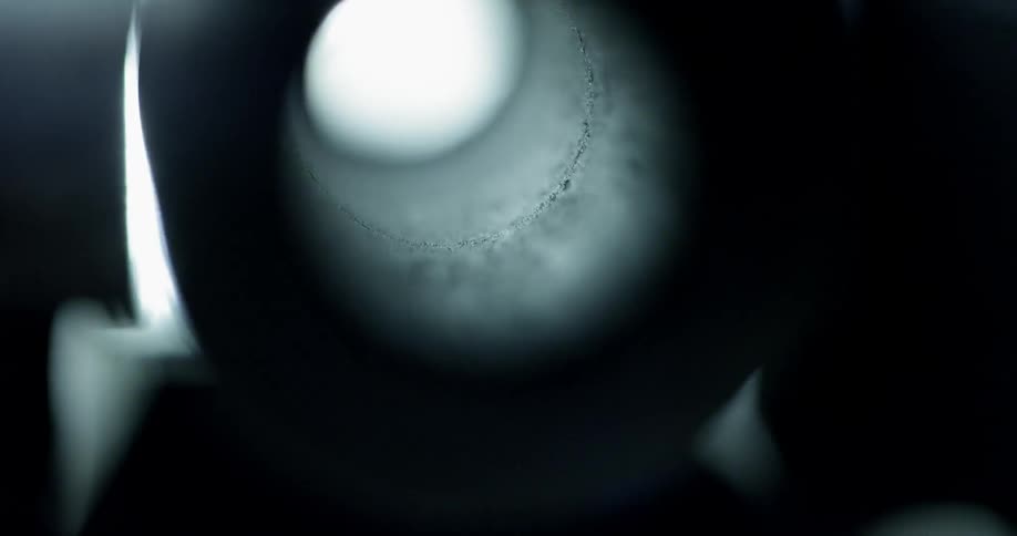 A metal cylinder has lights flashing through it