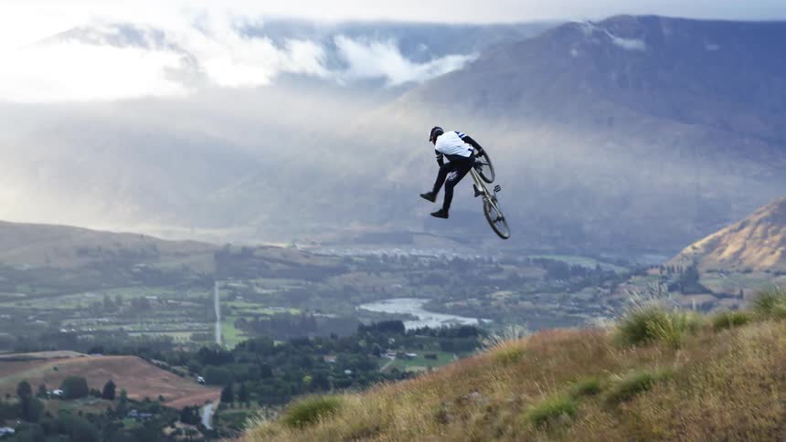 A man doing jumps on his bike