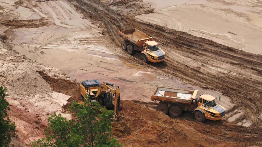 An aerial view of a construction site is displayed