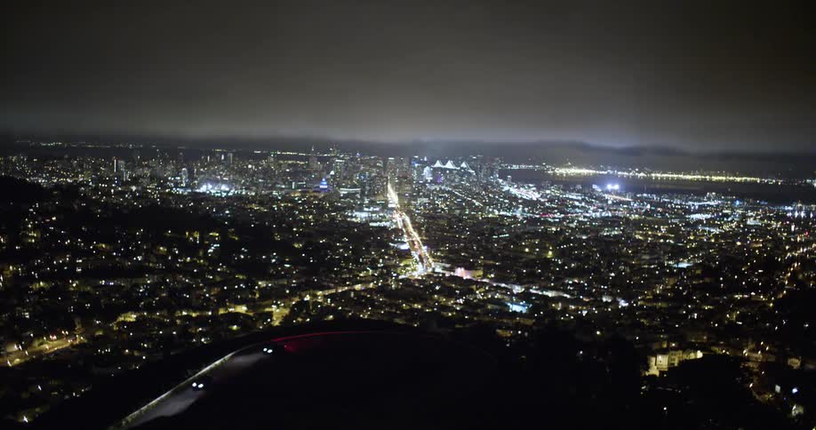 A city skyline all lit up at night