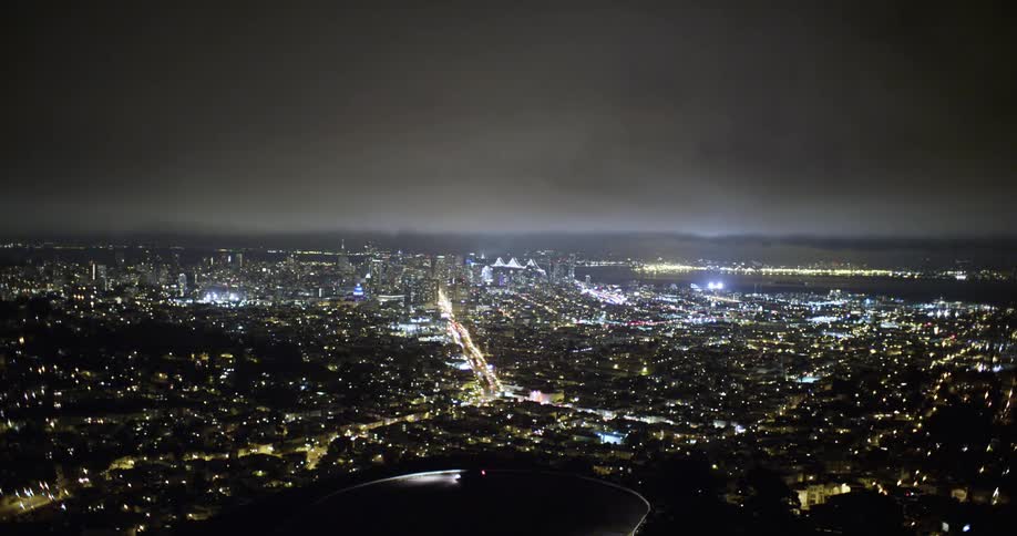 Landscape view of city downtown at night under the clouds