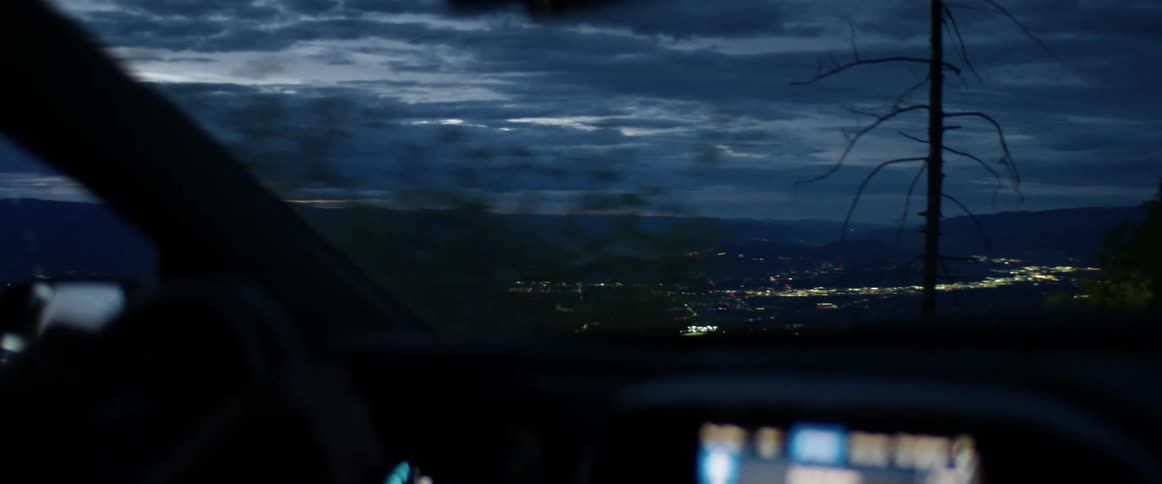 The view of a skyline from inside a car