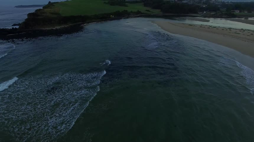 Aerial view of a beach at sunset