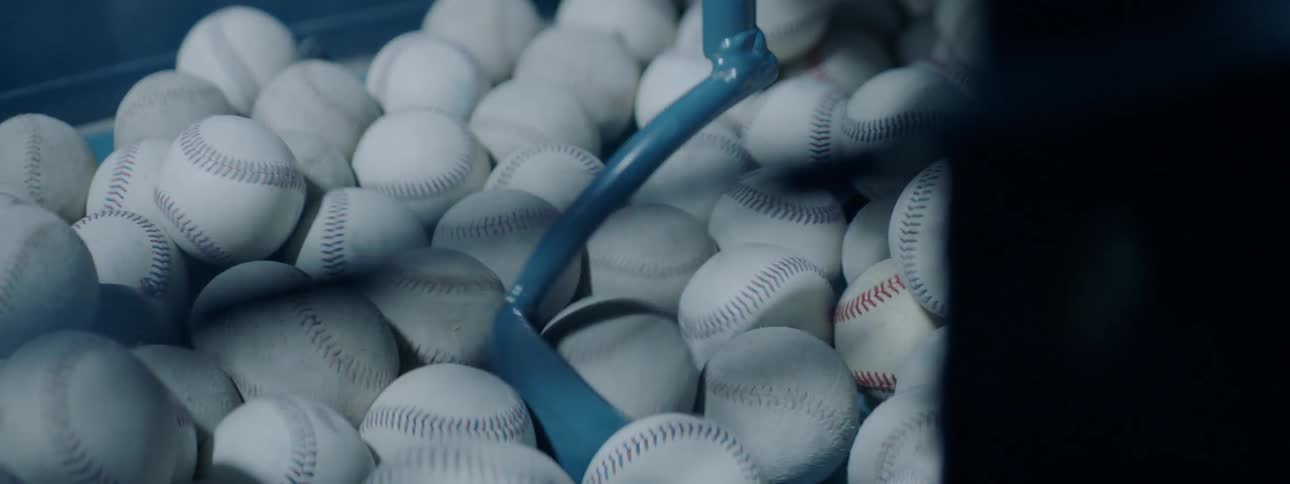 A bunch of baseballs are rotating together