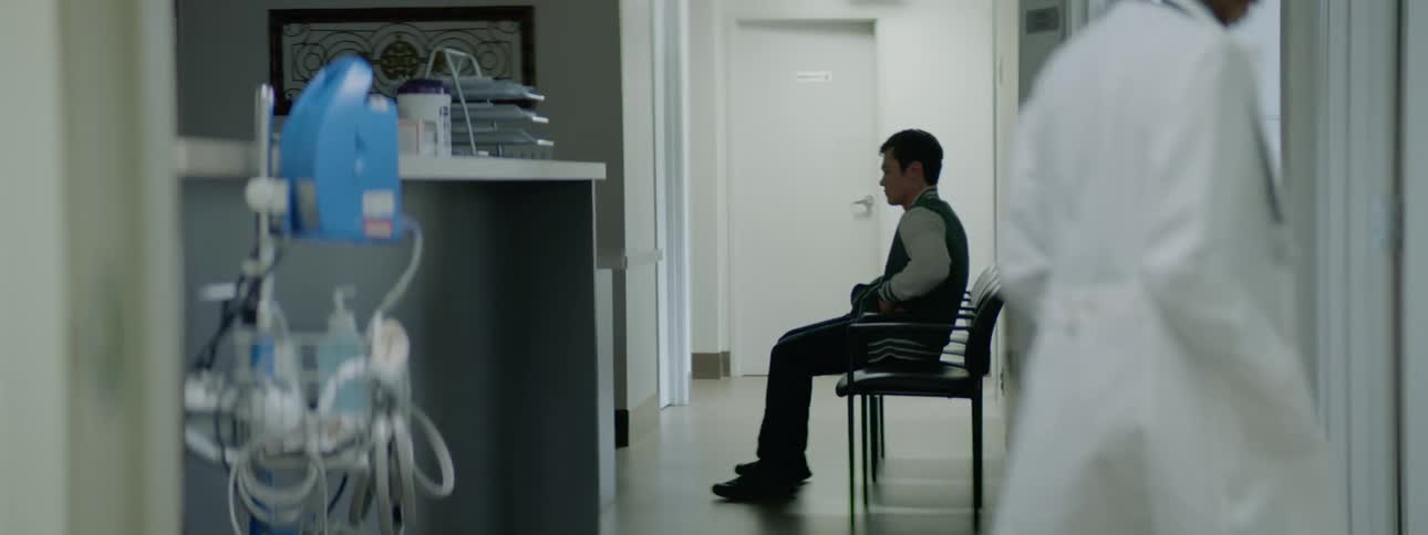A man is worried in the hall of the hospital