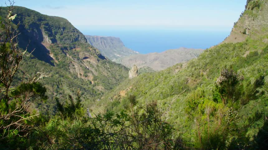 Landscape view of hills and a mountain range