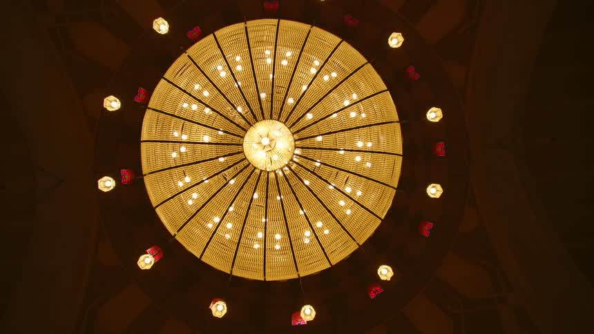 Worms eye view of a decorative light on a ceiling
