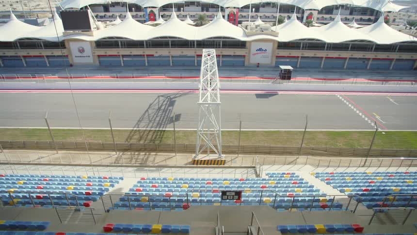 An empty car racing stadium during the day