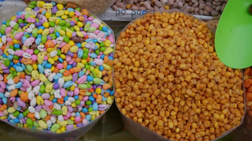 Bins of food and snacks at a market