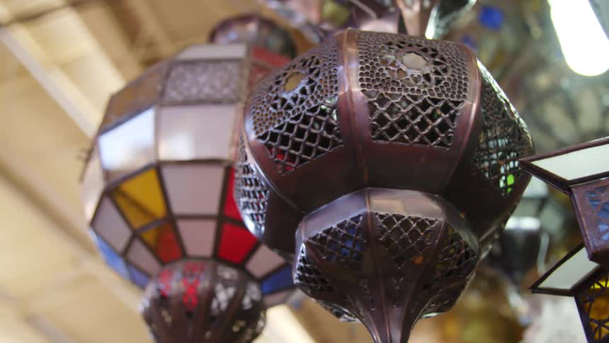 Decorative lights hanging from a ceiling in a store