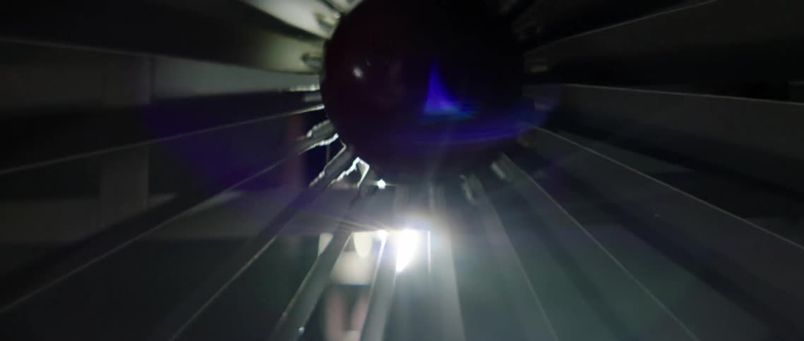 Light shining through vintage jet turbine blades