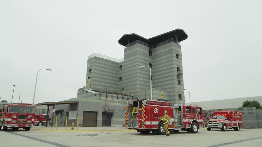 Firefighters arrive at fire training facility practicing their firefighting skills